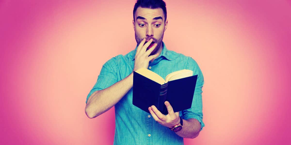 Debunking TikTok That Says 10 Books Removed From The Bible Could Get You Killed man looking shocked while reading the Bible