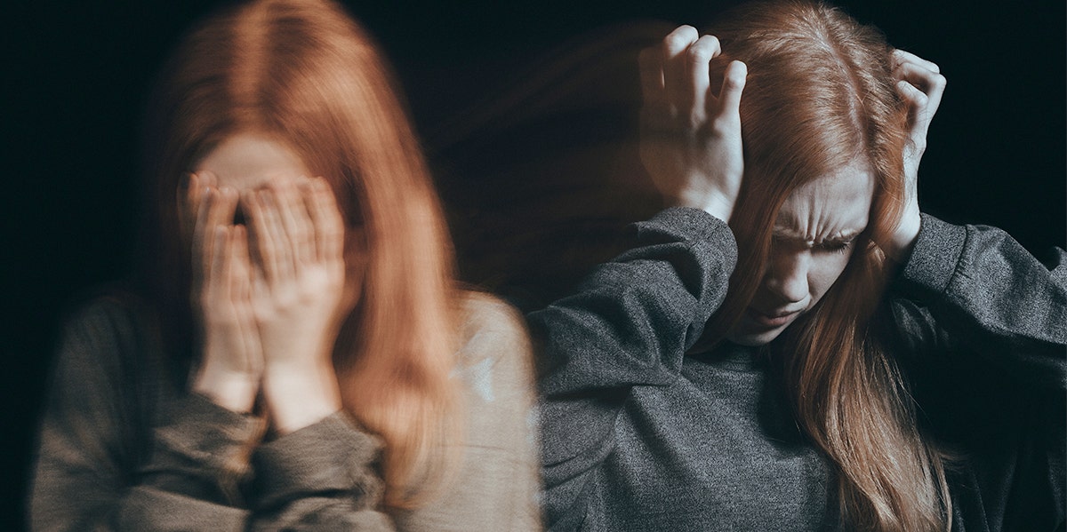 Inside The Heartbreaking Reality Of Borderline Personality Disorder woman with head in hands