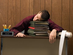 Study: Men Like To Flirt With Coworkers Out Of Boredom man asleep at his desk at work