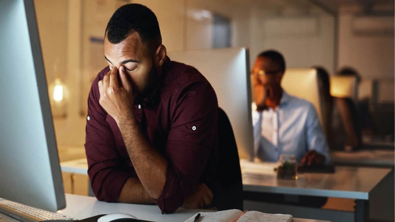 frustrated man at his desk