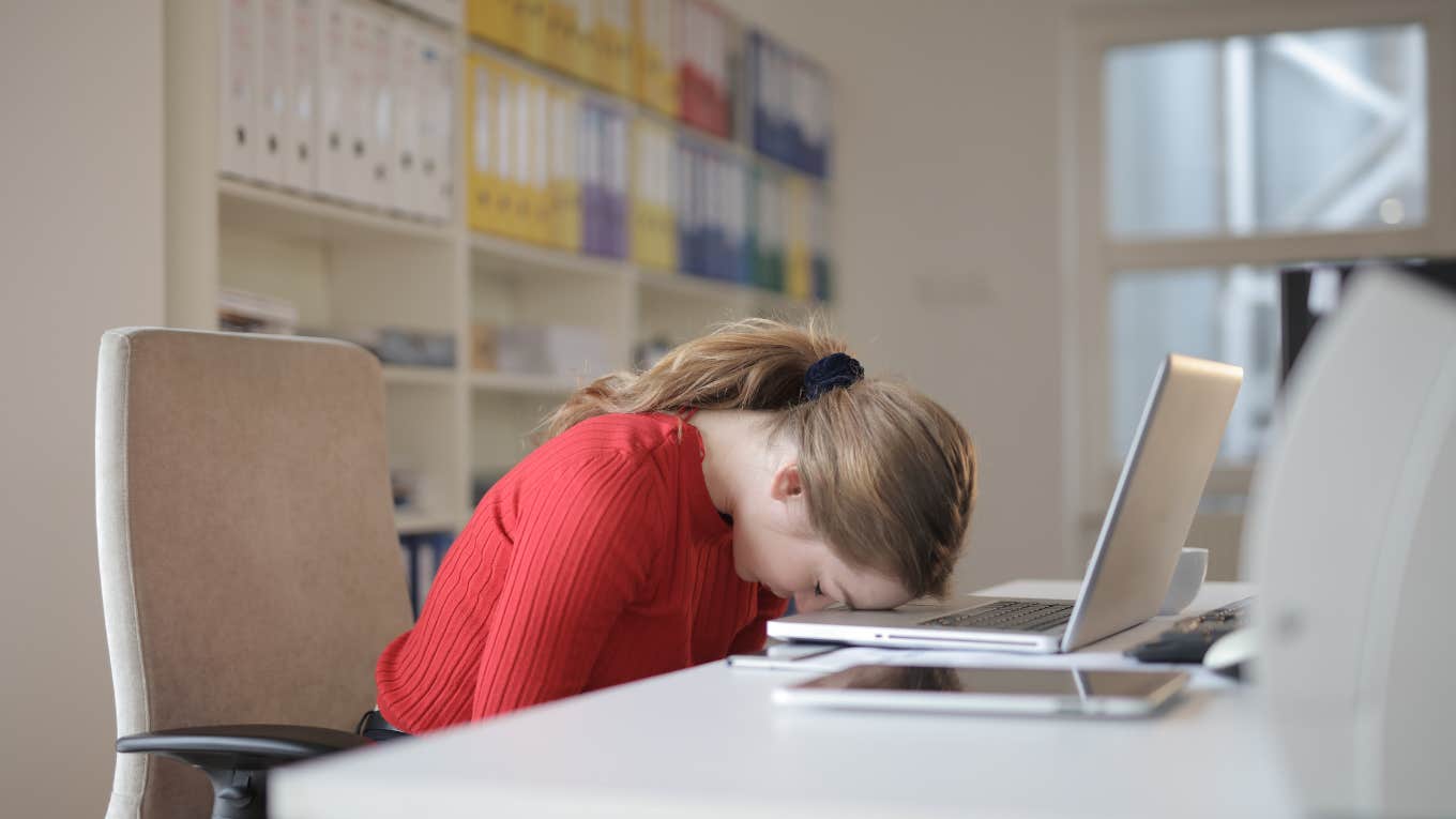 woman head down at work