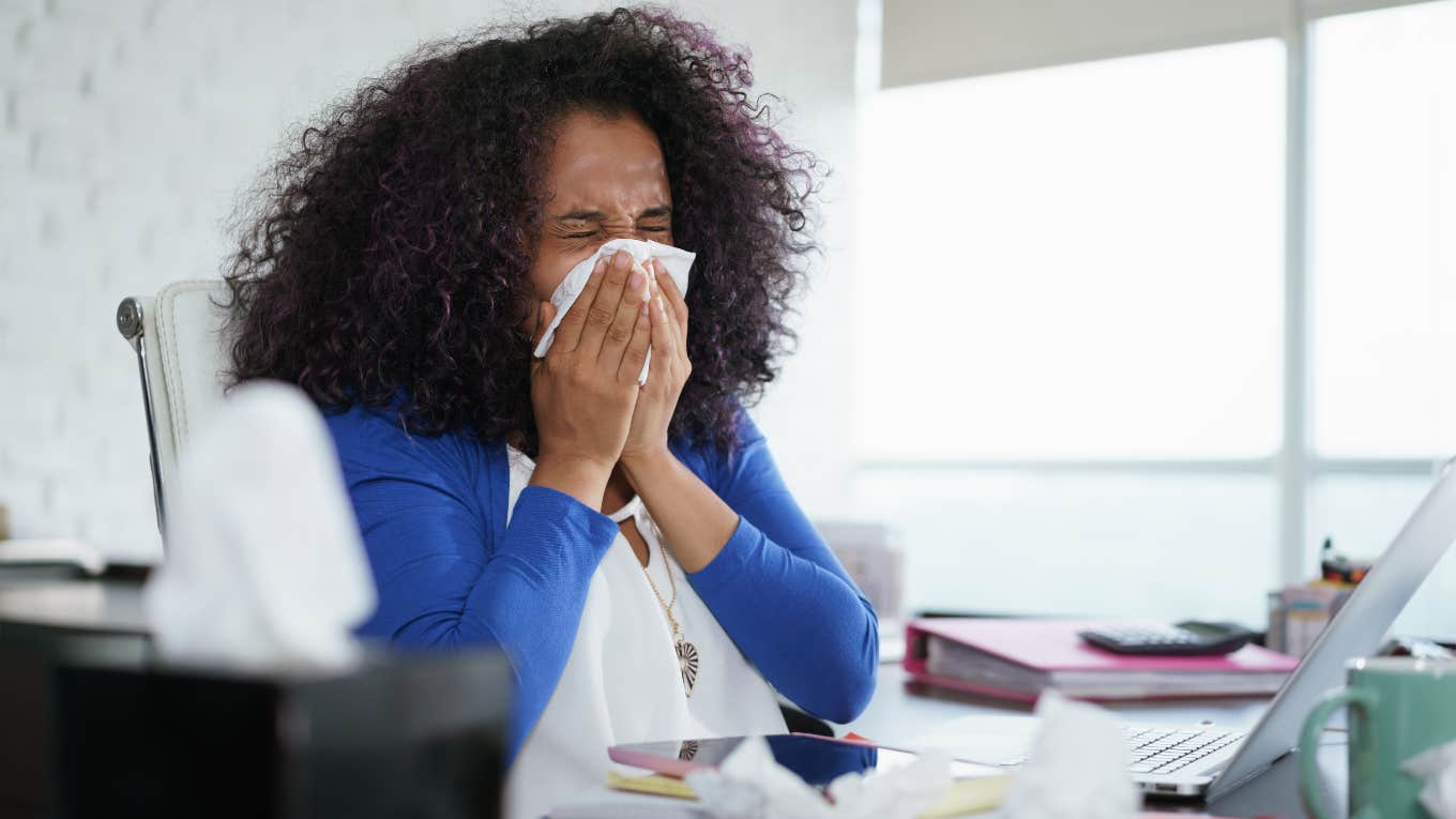 woman sick at work