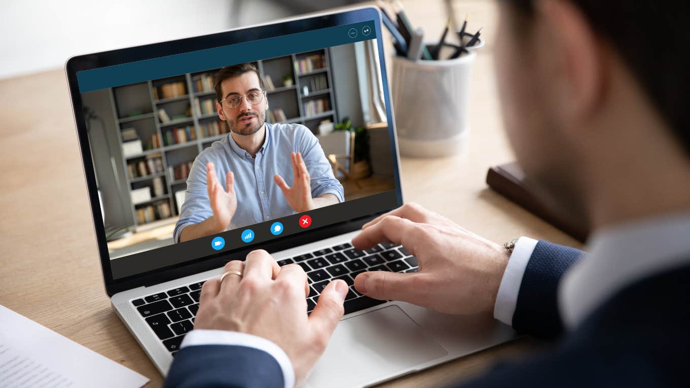 boss reprimanding employee for being on time to meeting