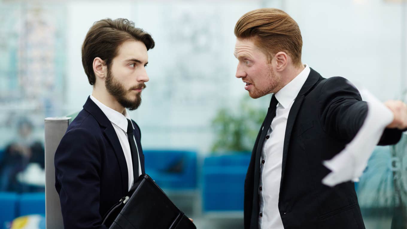 boss yelling at employee at work