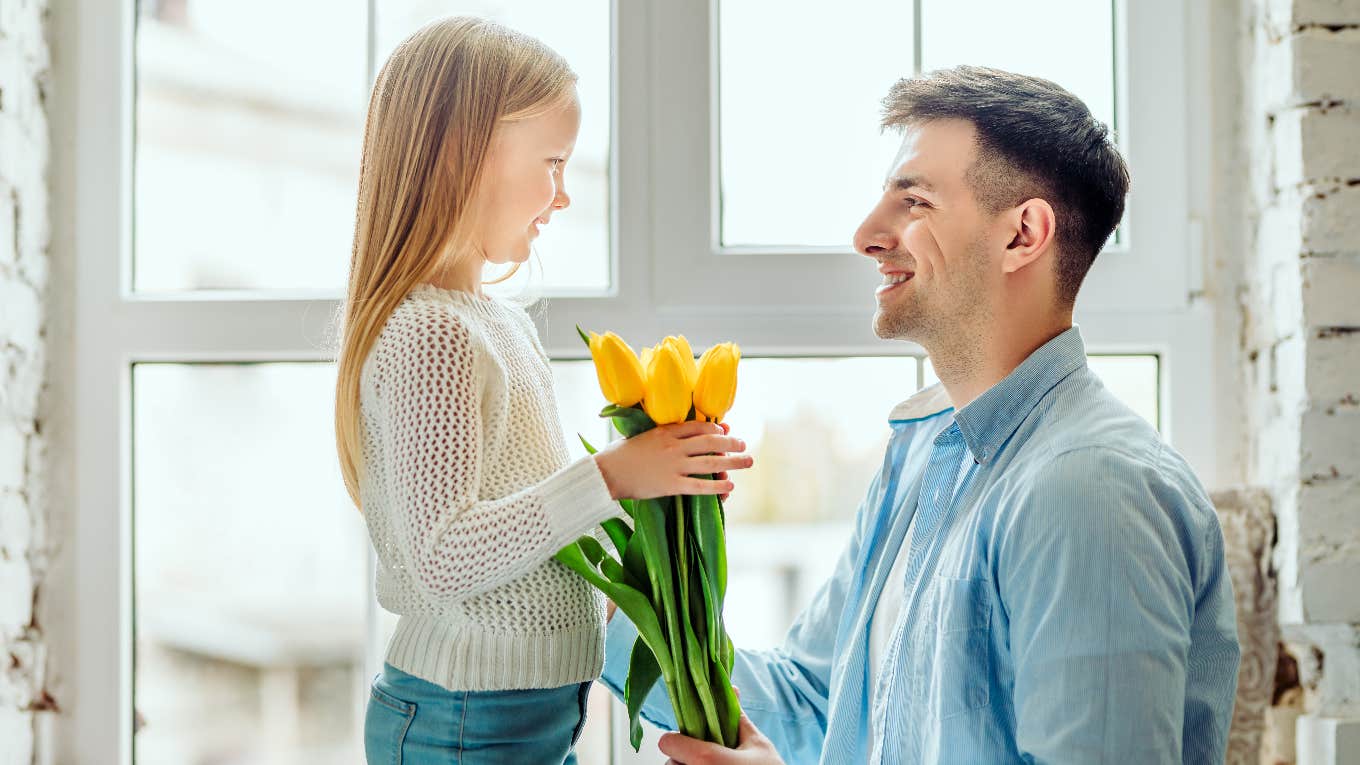 dad giving daughter flowers, Valentine's day