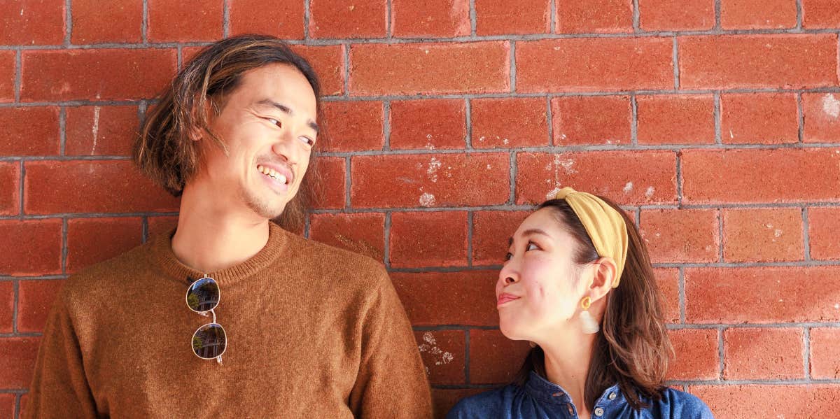 The 5 Words That Will Literally Save Your Marriage, According To Brené Brown couple looking at each other