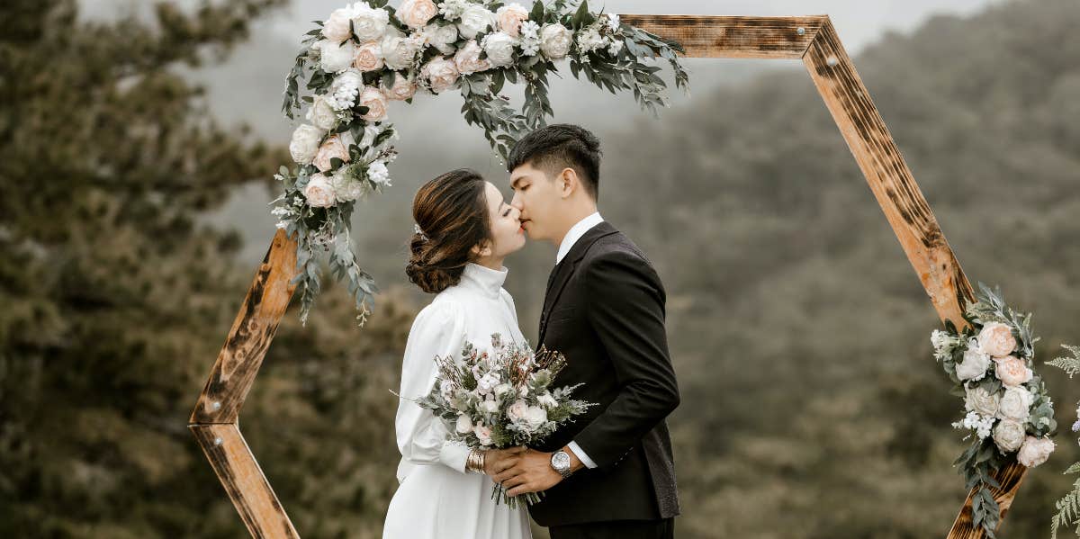 bride and groom kissing