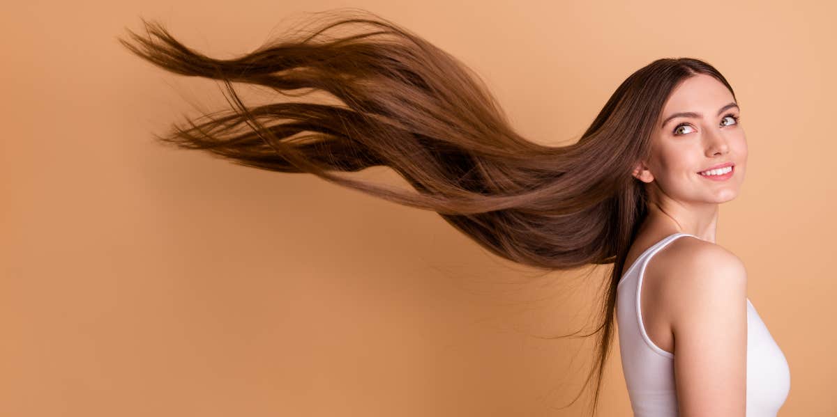 Bride Freaks Out After Her Sister Refuses To Cut Her Hair For One Day — 'It's Part Of My Identity' Woman with long hair