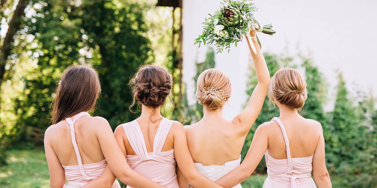 Bride Says She Hid Her Relationship Until She Sent Out Wedding Invitations, Sparking Debate Bride with bridesmaids