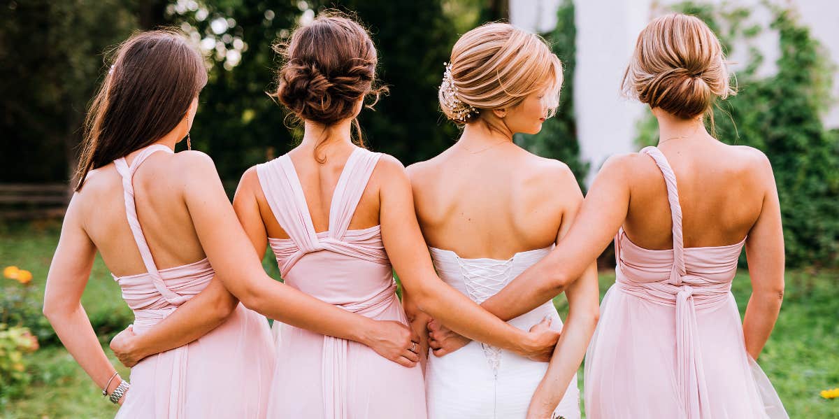 bride with her bridesmaids