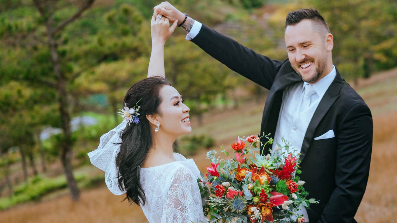 Bride's Family Enraged She Chose Flower Gremlins Instead Of One Flower Girl bride and groom