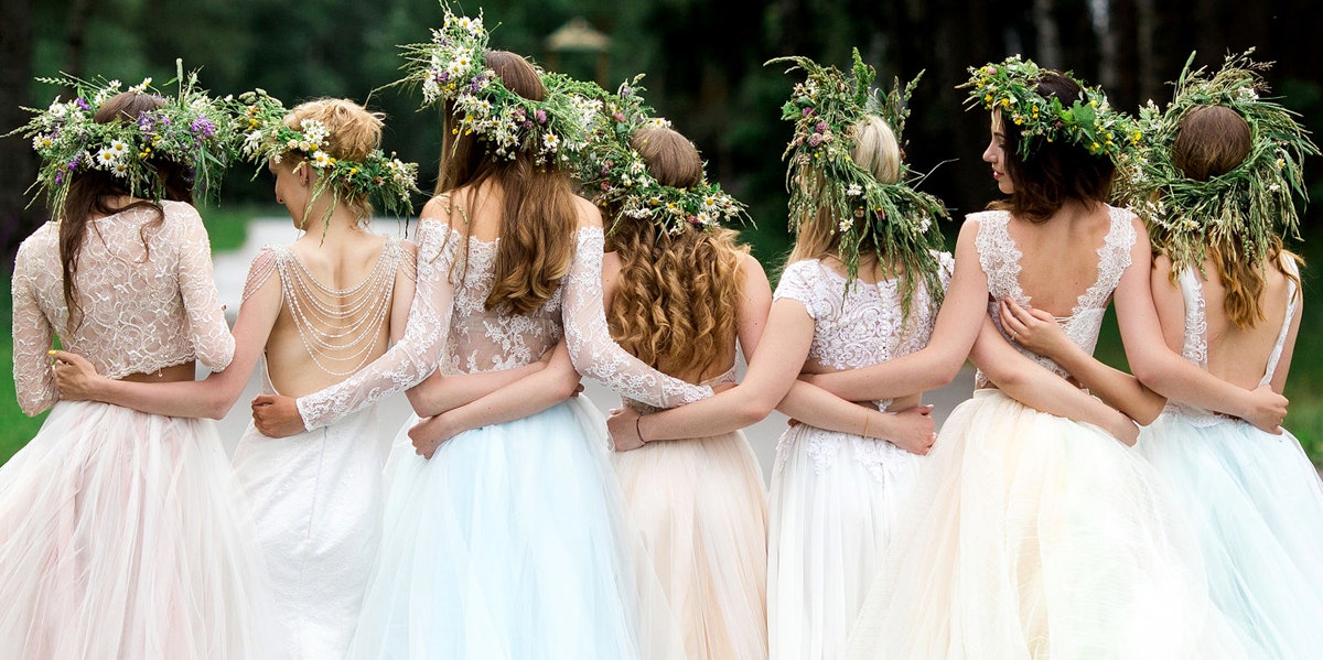 bridesmaids in a group taking a photo