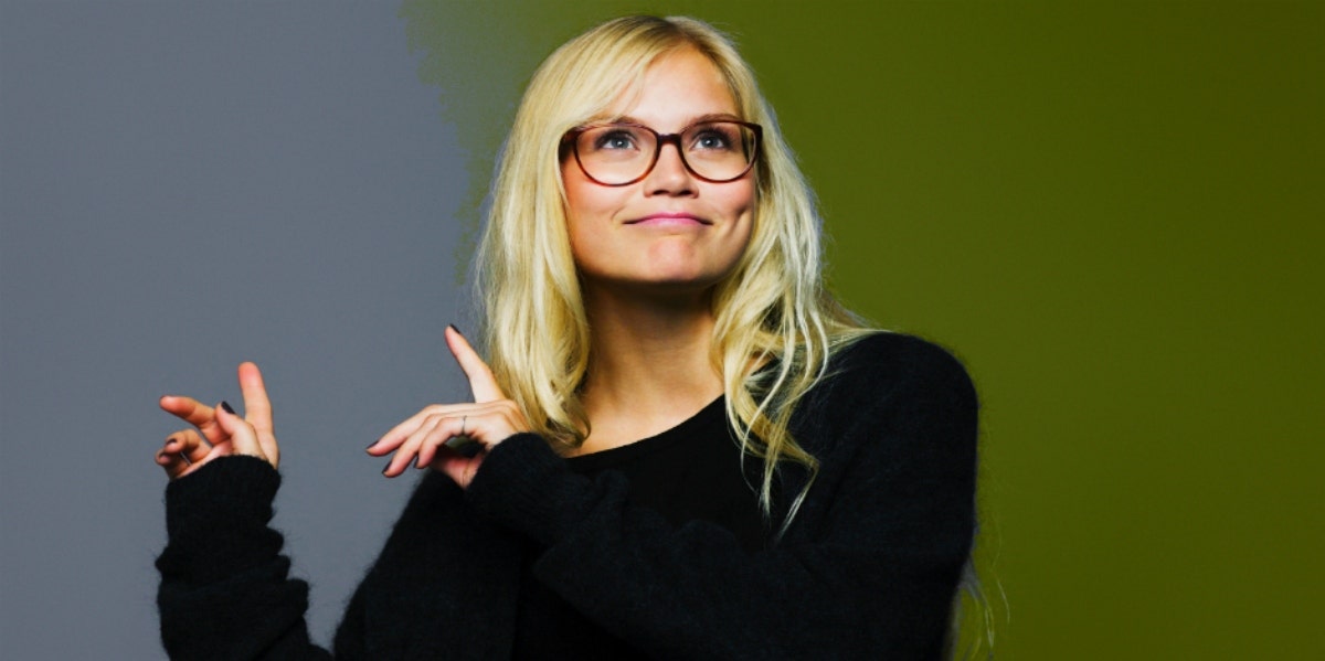 blonde woman wearing glasses