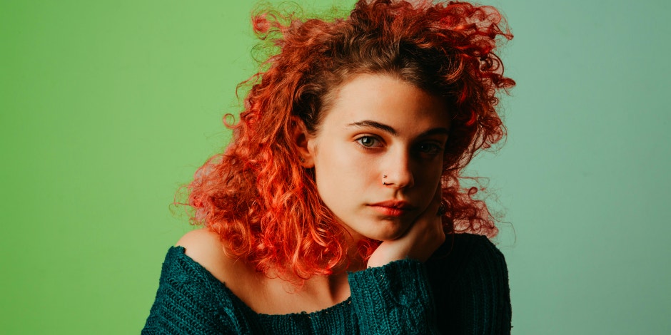 How I Broke Up With My Girlfriend (Even Though She's Still Dating My Husband) woman with crazy red hair against green background
