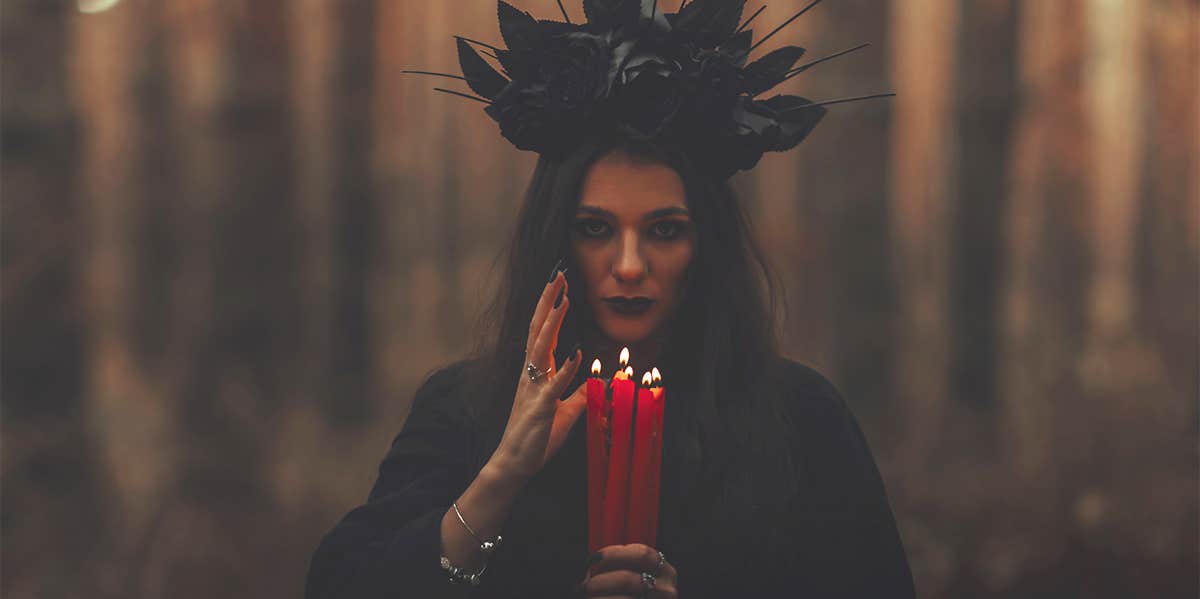 What Is A Bruja Or Brujo In Witchcraft? Brujeria Meaning Explained witch with candles