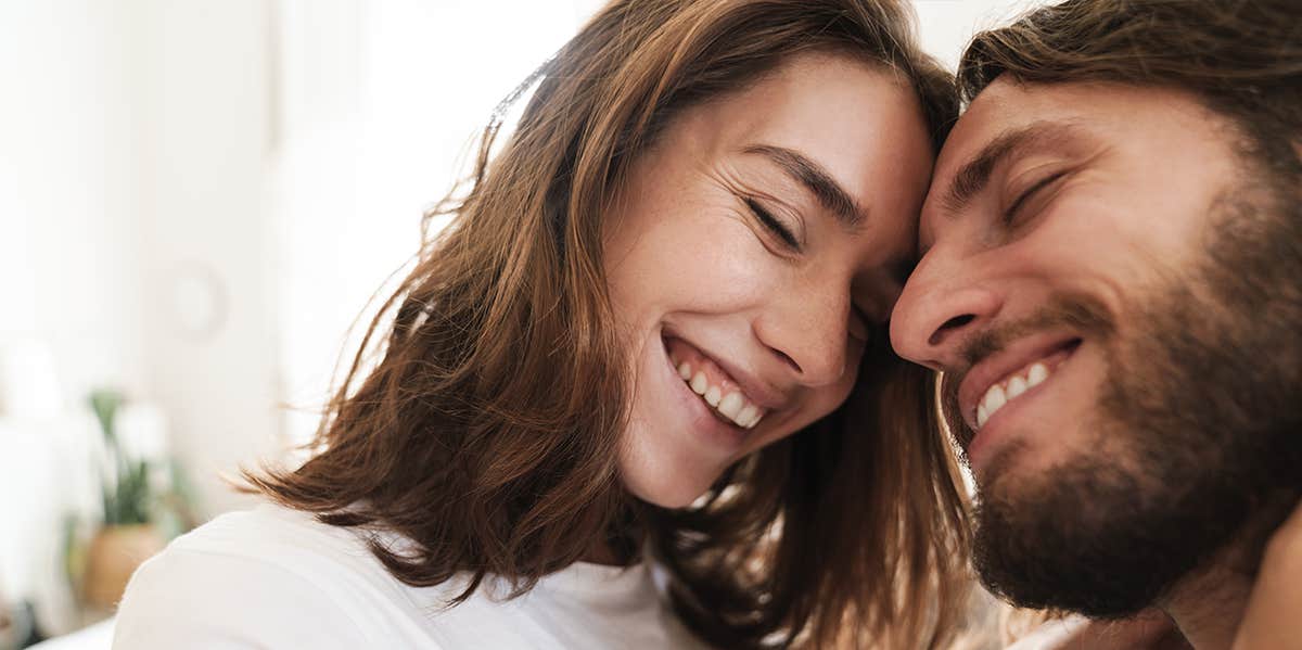 Brutal Truths About Loving An Only Child (As Written By One) man and woman nuzzling foreheads