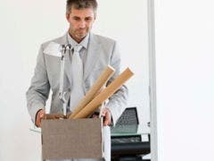 6 Ways To Cheer On An Unemployed Partner man-in-suit-carries-office-supplies