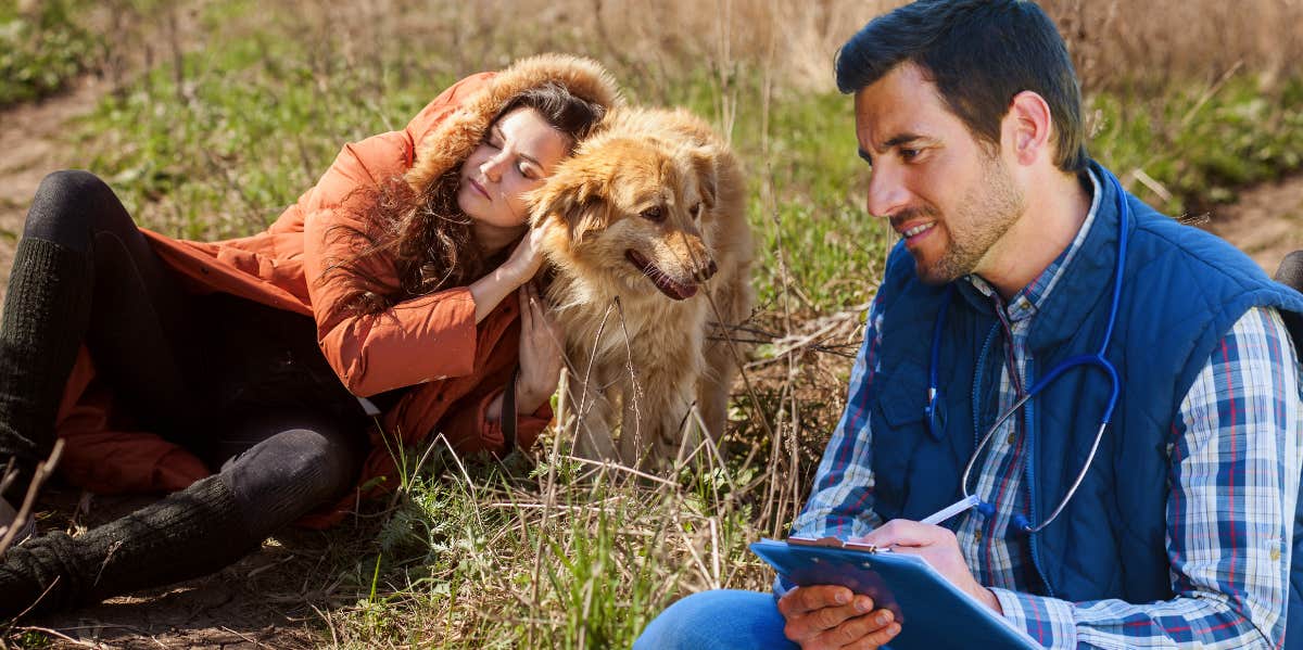 veterinarian treating homeless woman's dog