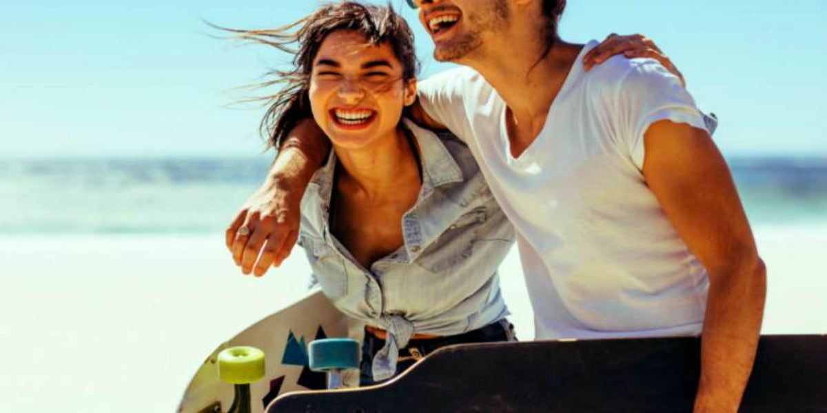 couple laughing on the beach