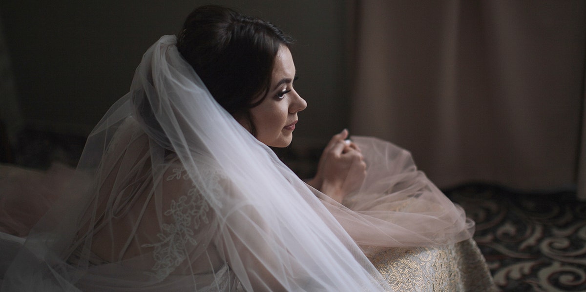 Why I Called Off My Wedding — Even Though Everything Was Paid For woman in veil in the shadows