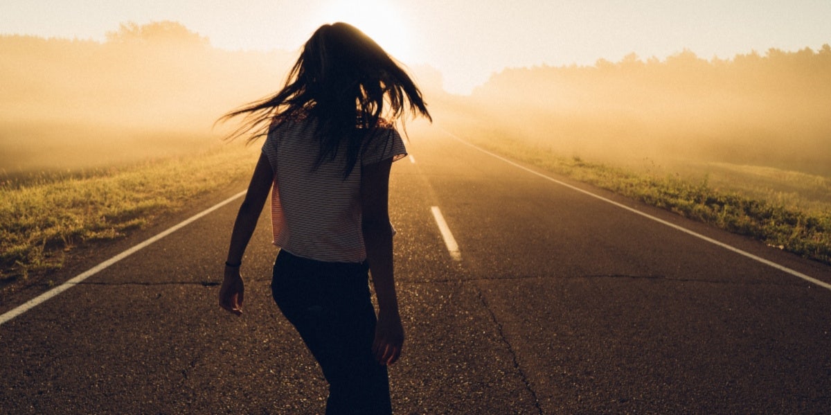 woman running on road