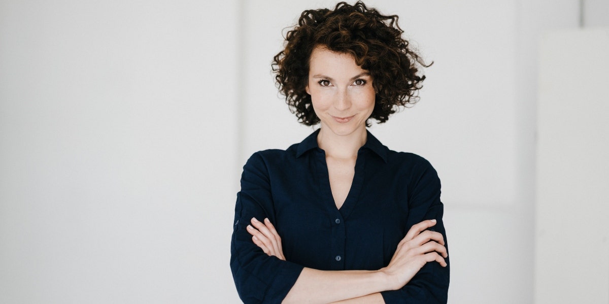 career change at 45 professional woman with arms crossed