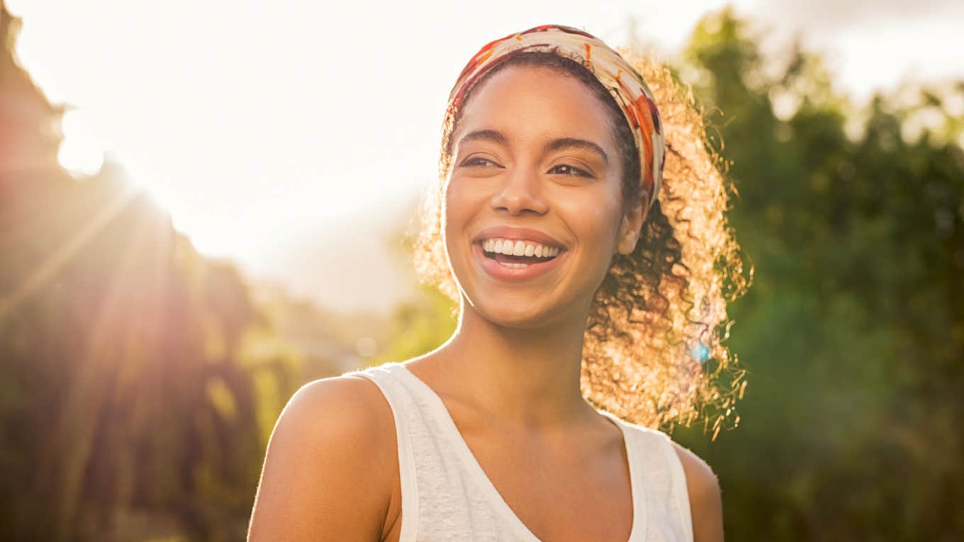 happy woman radiates positive energy