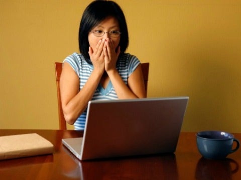 woman shocked at computer