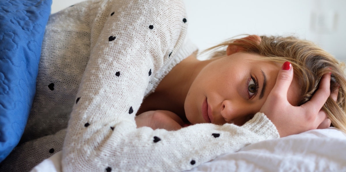 woman lying in bed