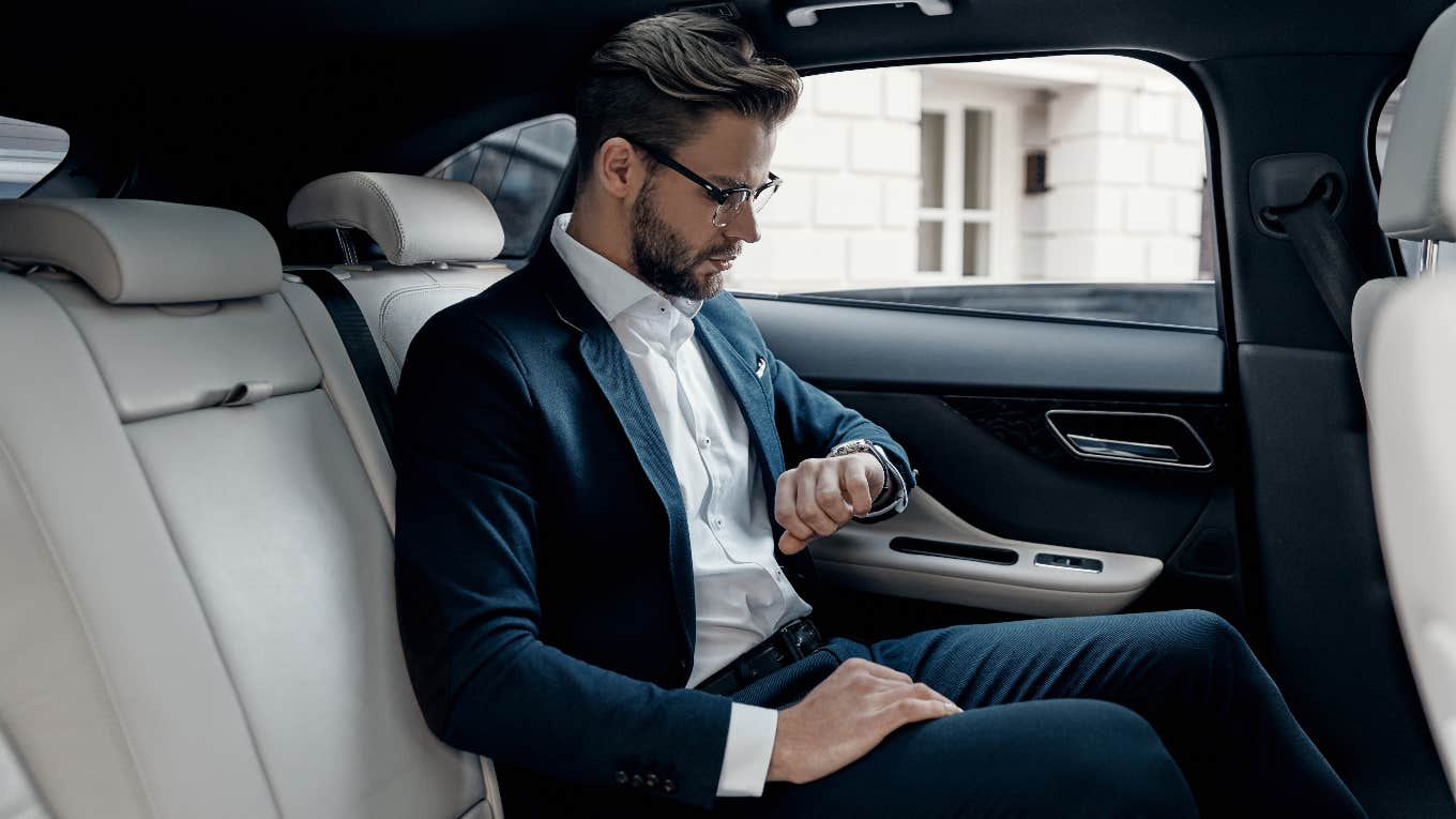 man in car going to job interview