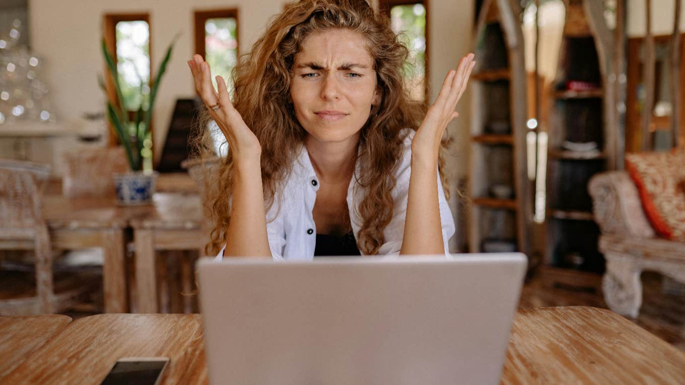 frustrated woman working on computer