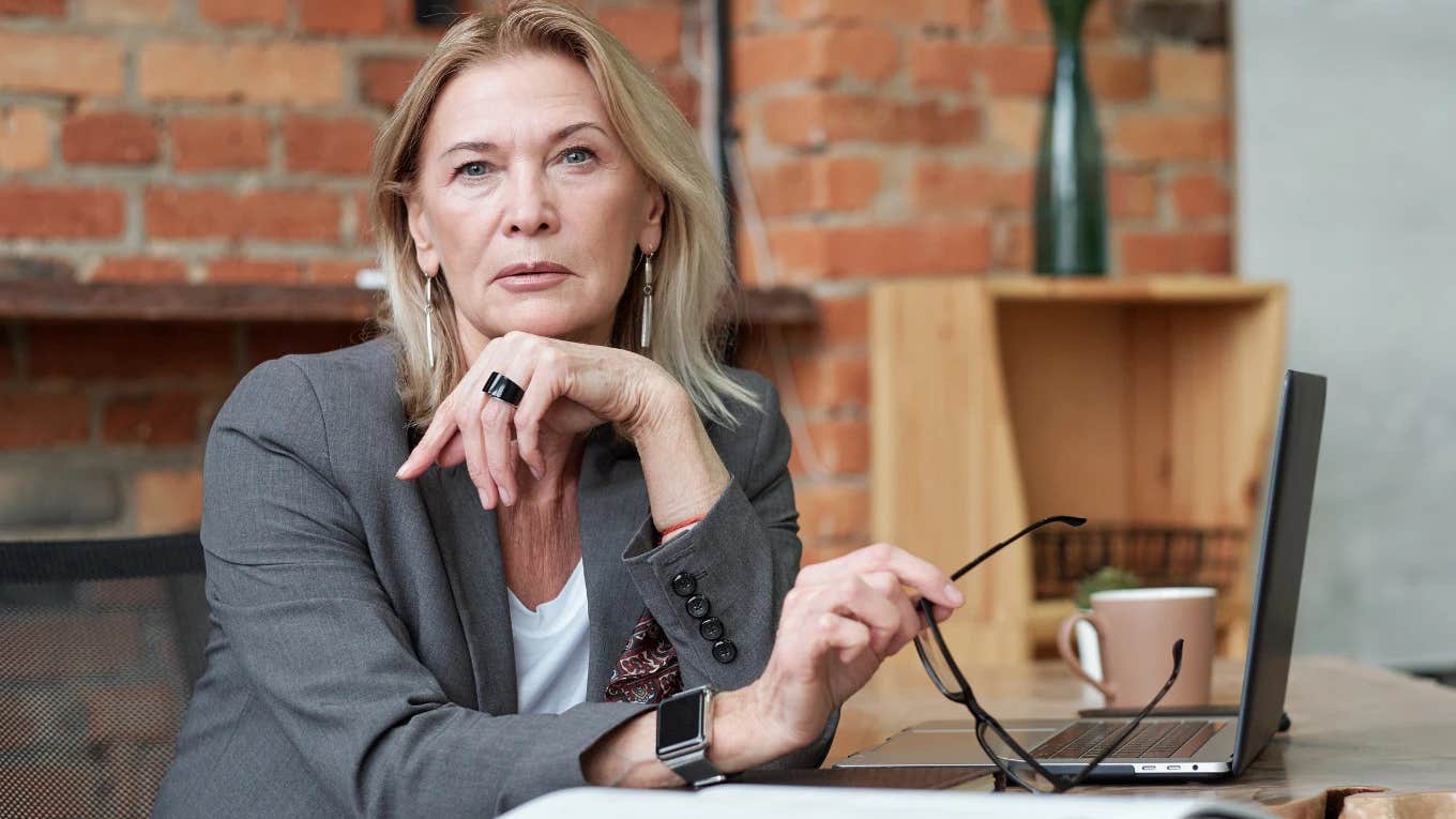 CEO Reveals Most Hurtful Thing Colleague Ever Said female CEO sitting at desk