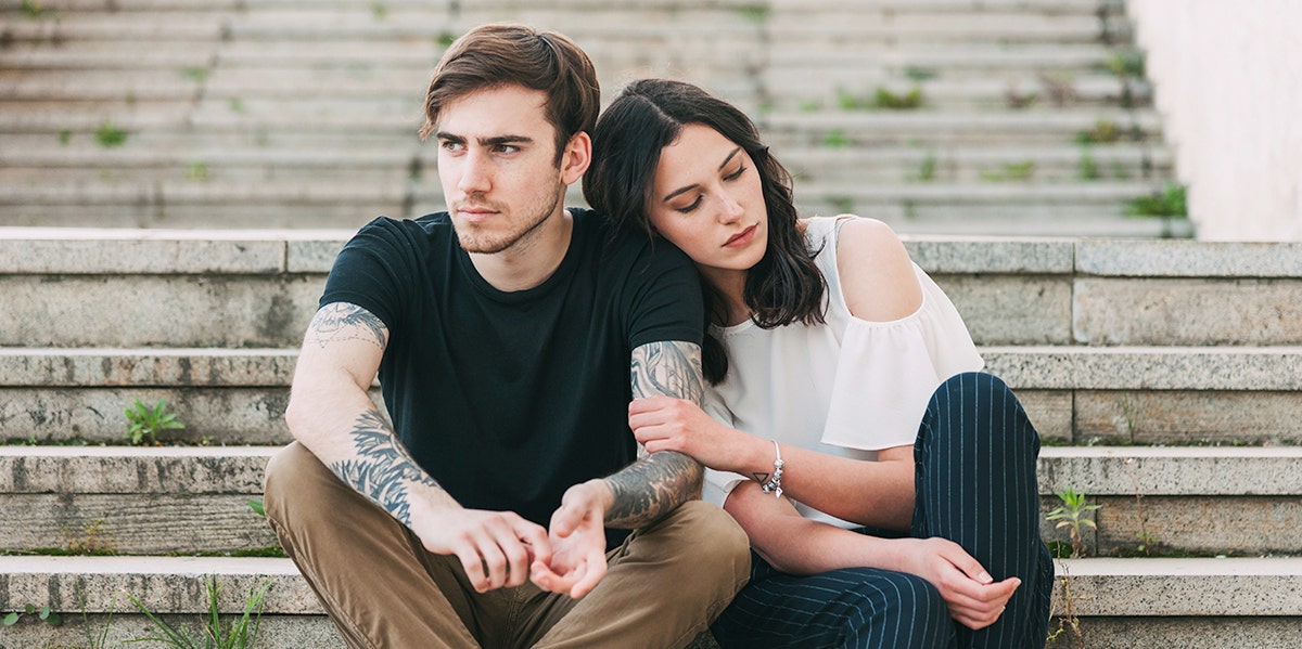 man and woman on steps