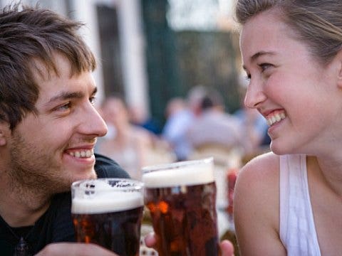 beer toast male female friends