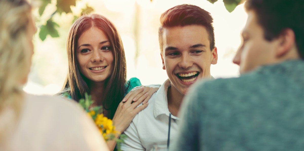 two happy couples hanging out