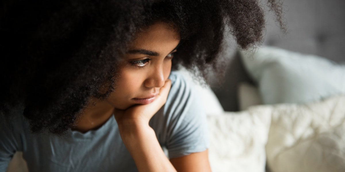 woman thinking about domestic violence in the past