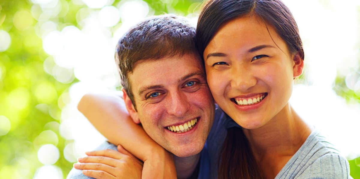 Happy couple together outdoors