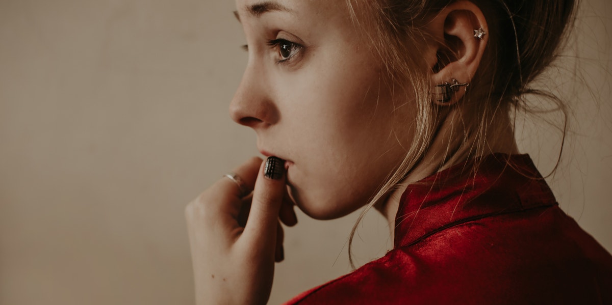 What Is Cognitive Dissonance? Effects, Examples & How To Resolve It worried woman