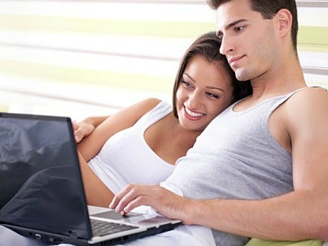 couple watching laptop