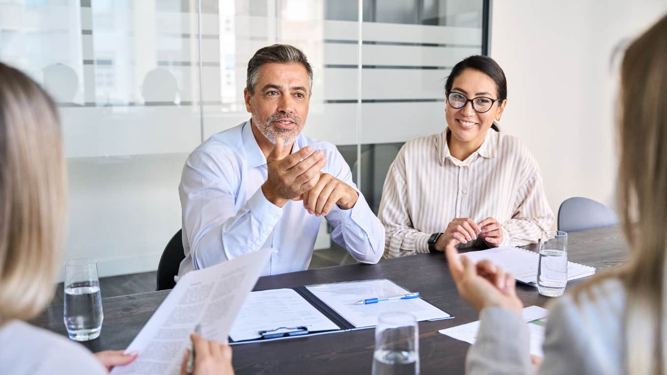 businesspeople having meeting in conference room