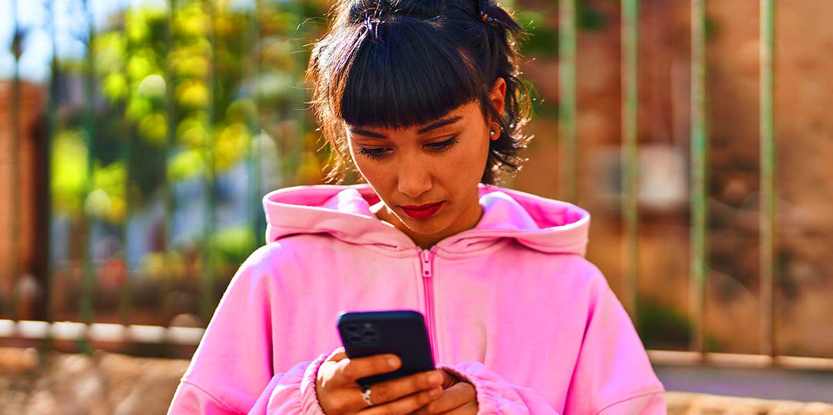 woman texting on phone