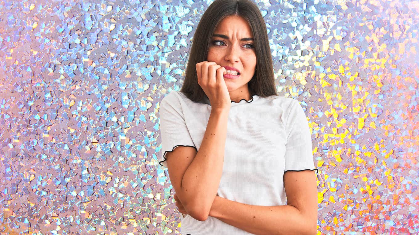 Young beautiful woman looking stressed and nervous