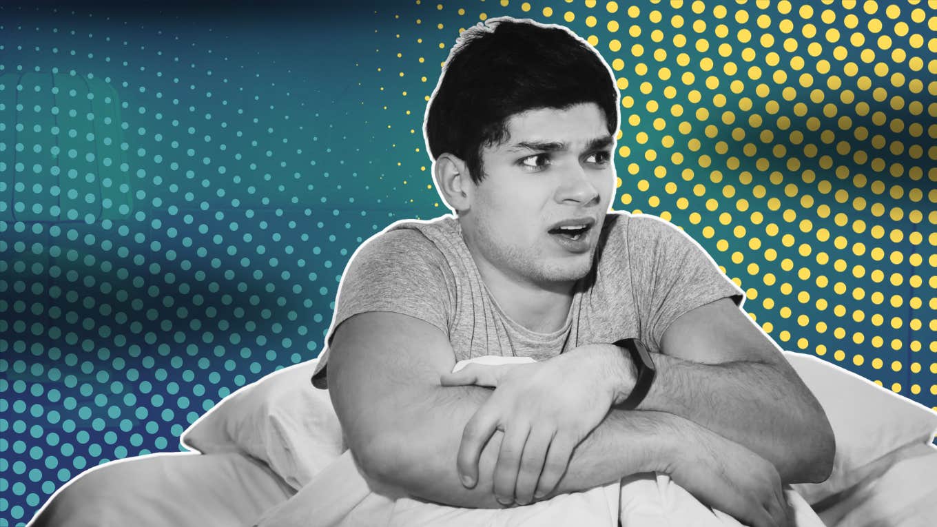 How To Cope With Traumatic Nightmares man scared of a nightmare in bed
