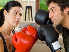 man and woman boxing