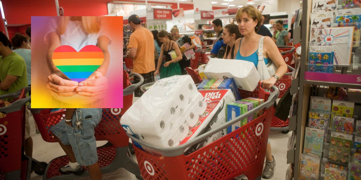 A Couple Found A Discontinued Target Pride Onesie In Store But Employees Stopped Them From Buying It For Their Baby Woman shopping at Target, woman holding a rainbow heart