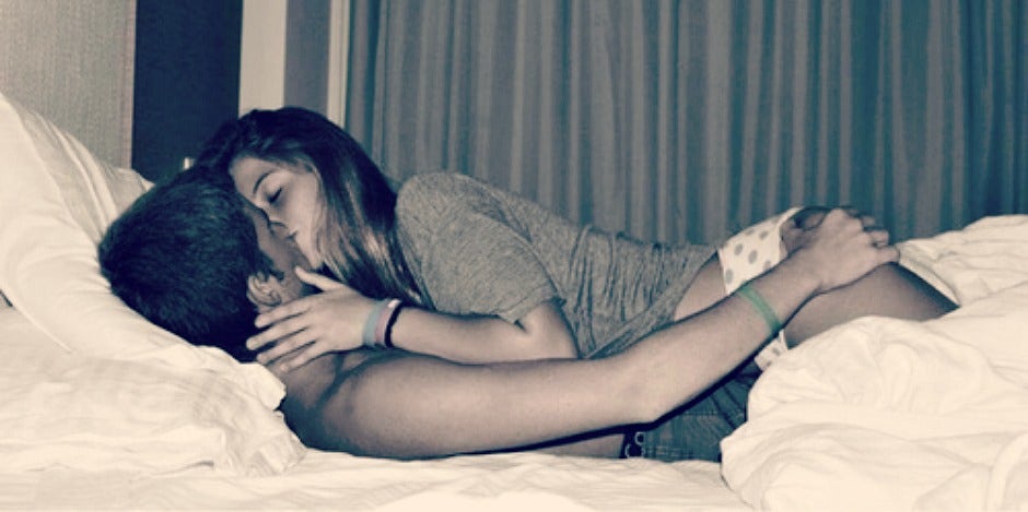couple in bed makeout couple in bed makeout