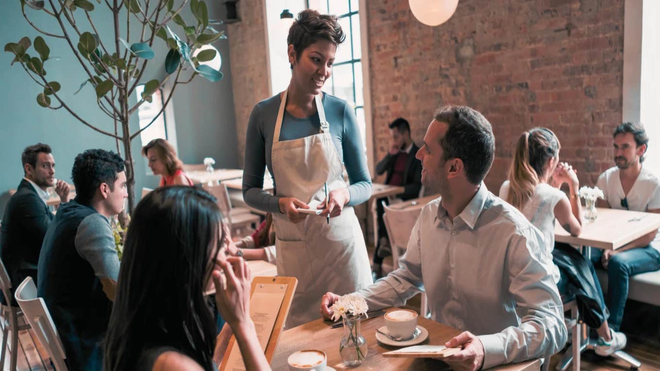 Couple Refuses To Leave Server A Tip After She Asked If They Wanted Separate Checks waitress serving customers