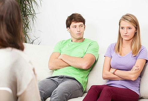unhappy couple with a therapist