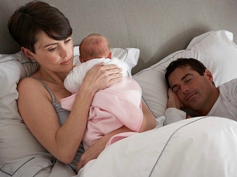 couple stressed with newborn