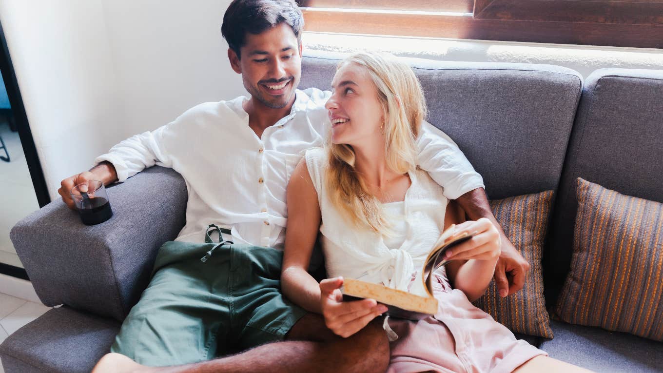 couple on the couch looking at each other